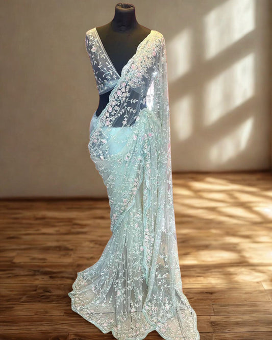 Blue Net Saree With Heavy Hand Embroidery And Unstitched Blouse